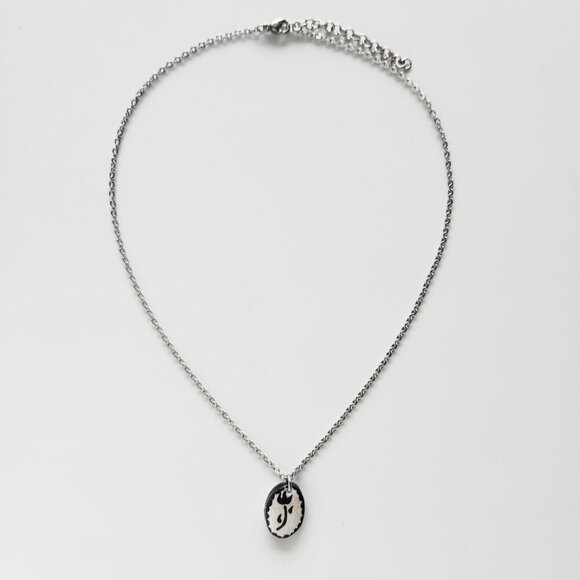 Dainty iridescent flower necklace with a small silver chain - Picture 5 of 8
